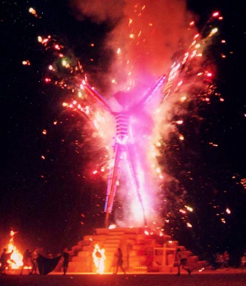 Two Burning Men Burning Man is lit by an asbestoscovered burning human 